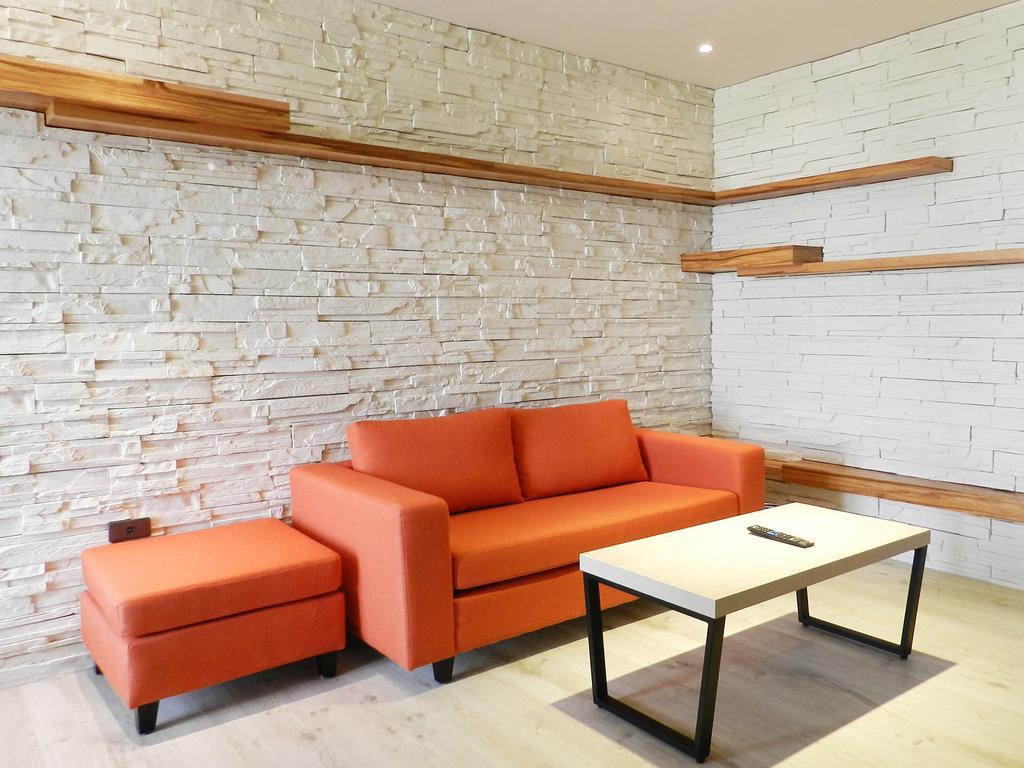 Look Royal Resort Цзяї Екстер'єр фото A modern sofa
